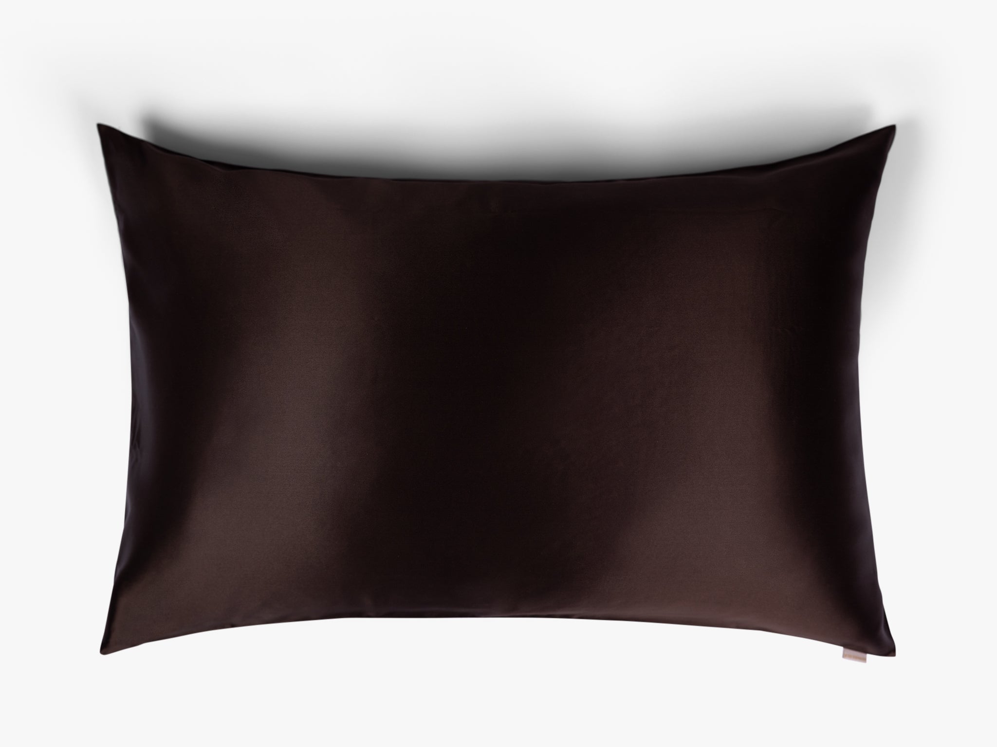 Coffee mulberry silk pillowcase on white background
