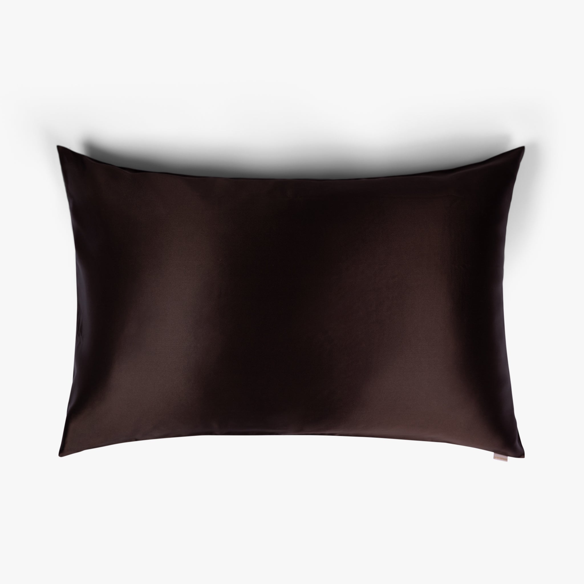 Coffee mulberry silk pillowcase on white background