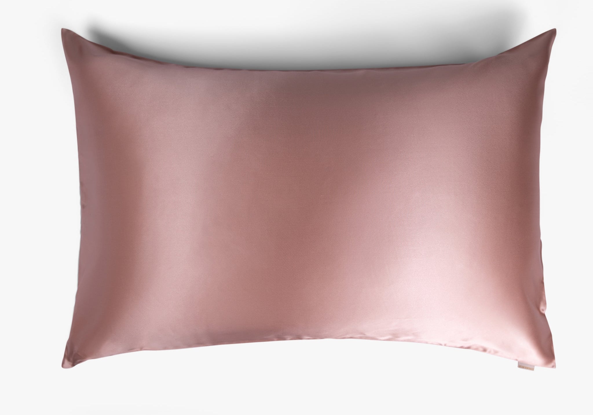 Cherry pink mulberry silk pillowcase on white background