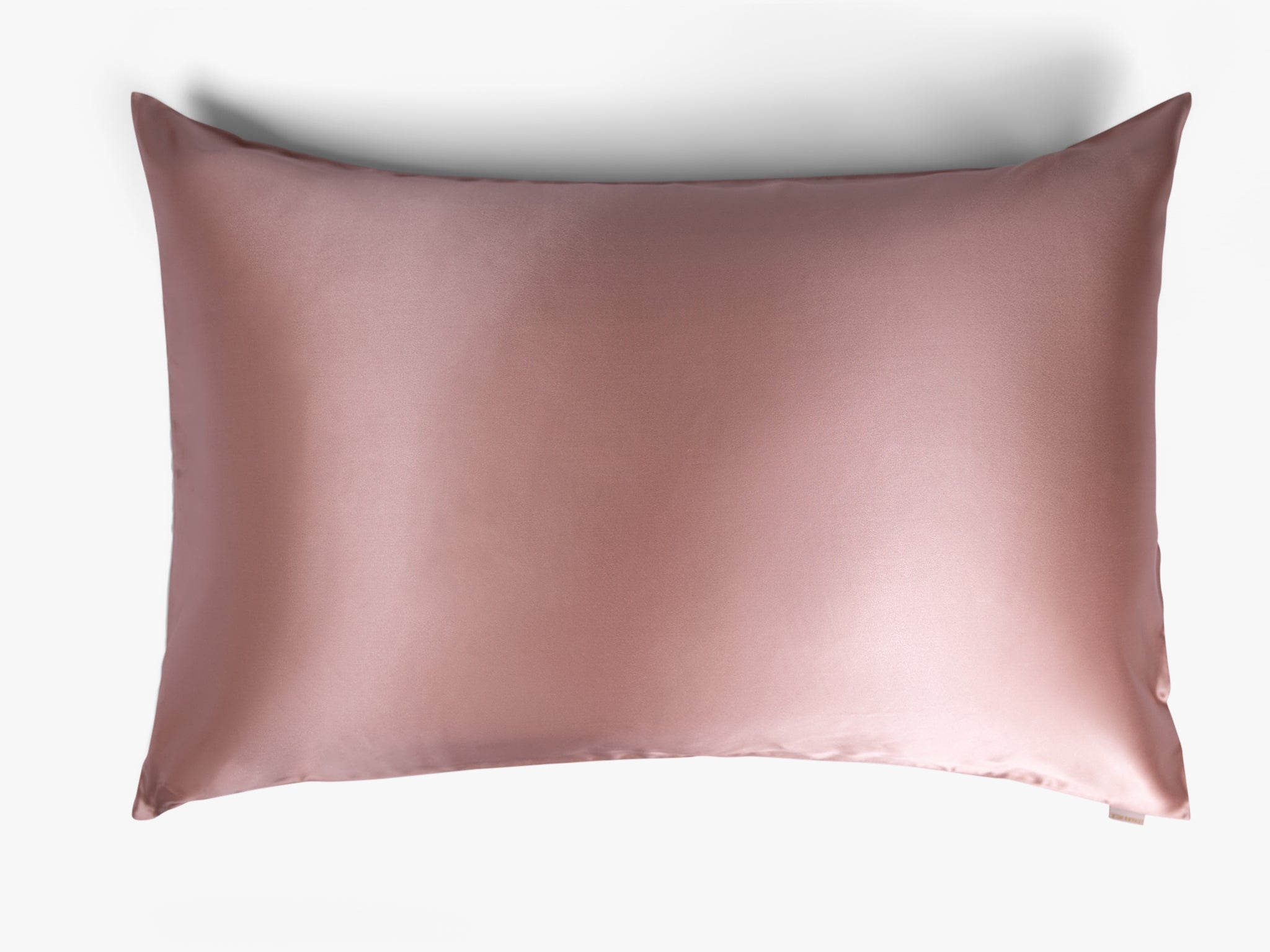 Cherry pink mulberry silk pillowcase on white background