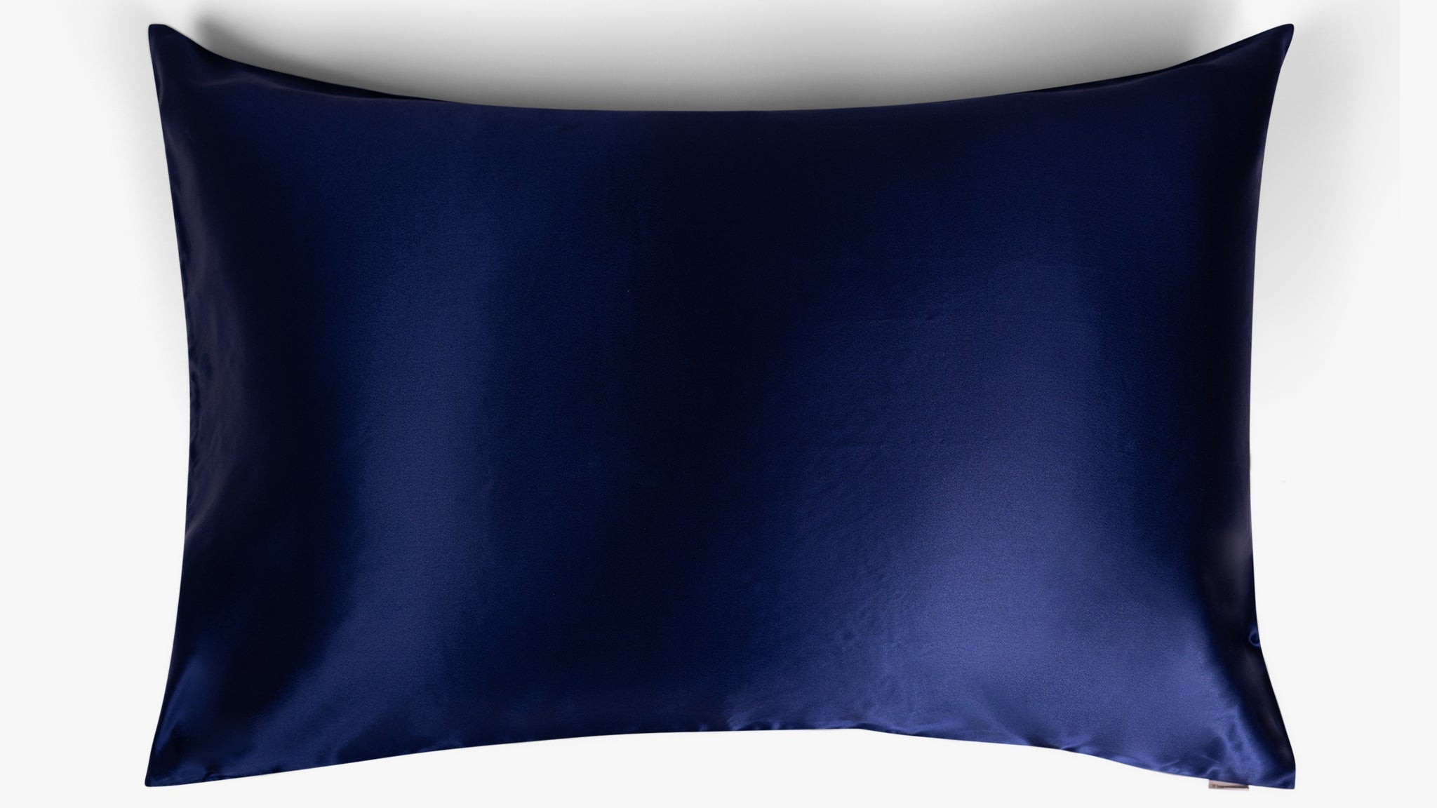 Navy blue mulberry silk pillowcase on white background