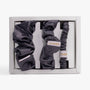 Dark grey silk scrunchies set in open box top view
