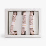 Three champagne scrunchies in a white box with 'Luna' branding