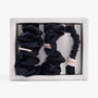 Black silk scrunchies set in open box top view
