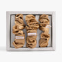 Amber gold large silk scrunchie in open box top view
