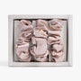 Champagne large silk scrunchie in open box top view
