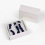 Set of three navy blue scrunchies in a white box with 'LUNAIRE HOME' branding.