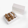 Set of Amber gold scrunchies in a white box with 'LUNARE HOME' branding on a white background