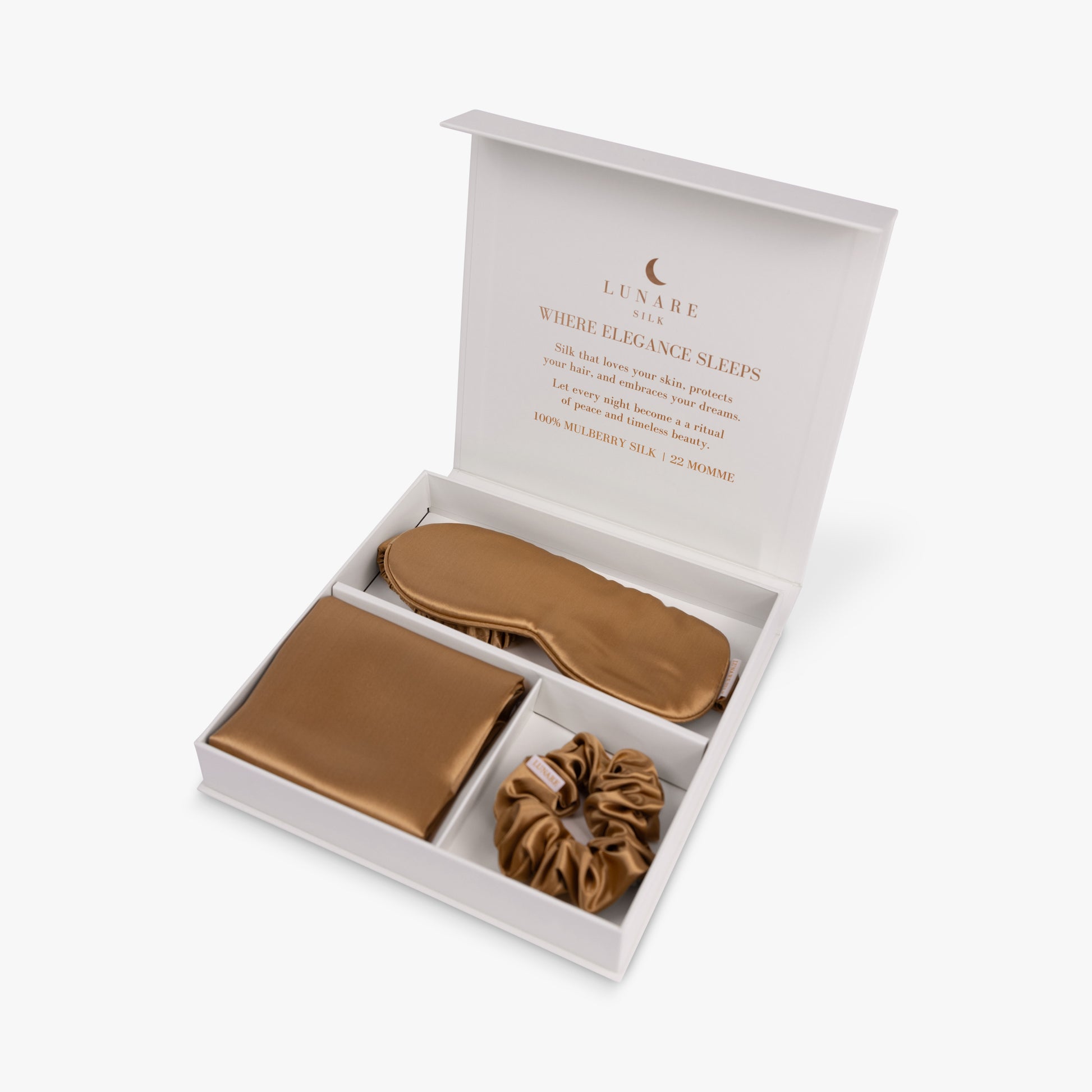 Amber gold ritual silk bundle set in open gift box
