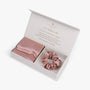 Rose gold essential silk bundle in open box with pillowcase and scrunchie
