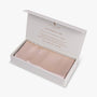 Champagne silk pillowcase in open gift box

