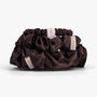 Coffee silk scrunchies stacked from large to small on white background
 lunare logo