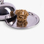 Amber gold large silk scrunchie on silver tray with lid
