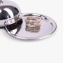 Stack of rings on a silver tray with a silver lid