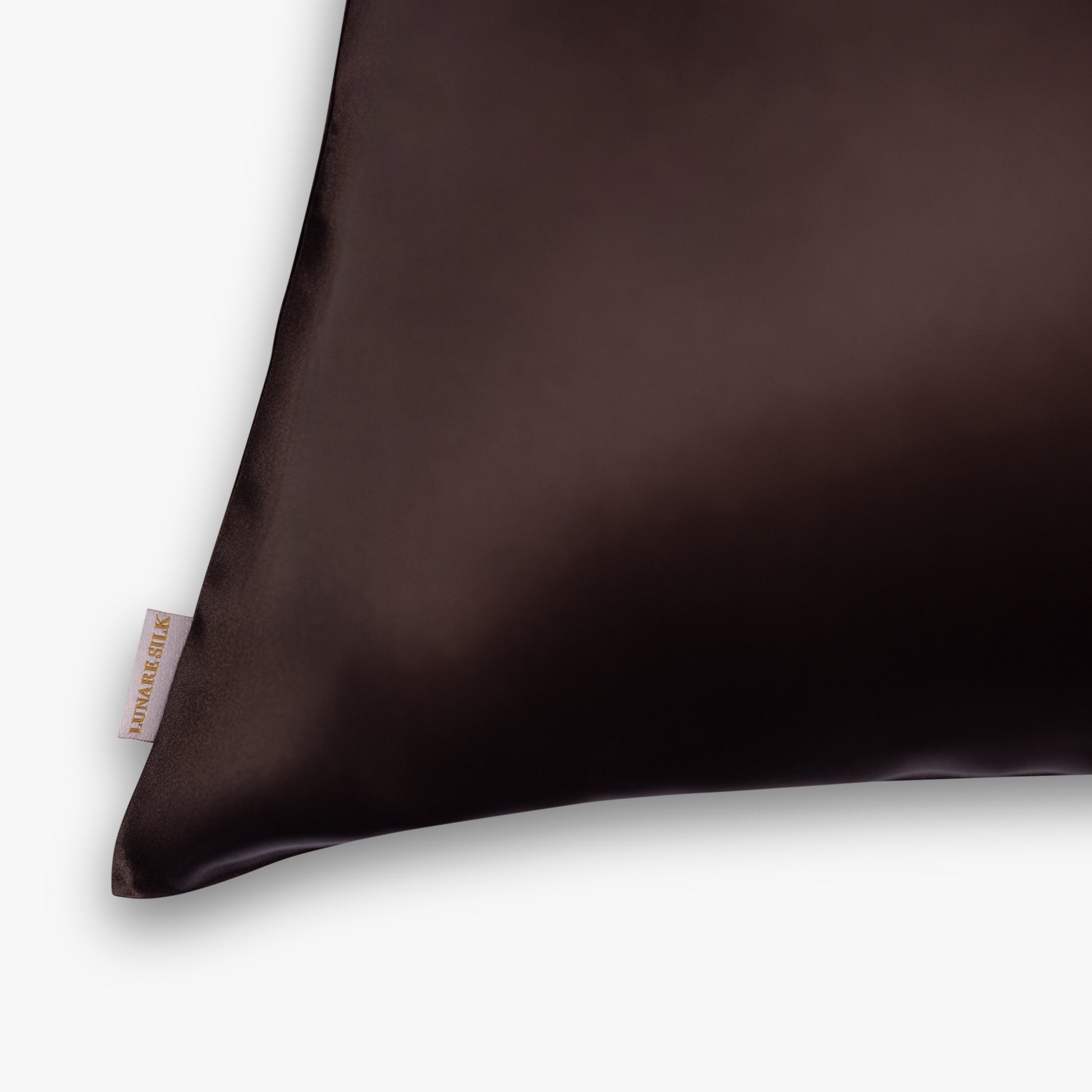 Coffee silk pillowcase logo close-up
