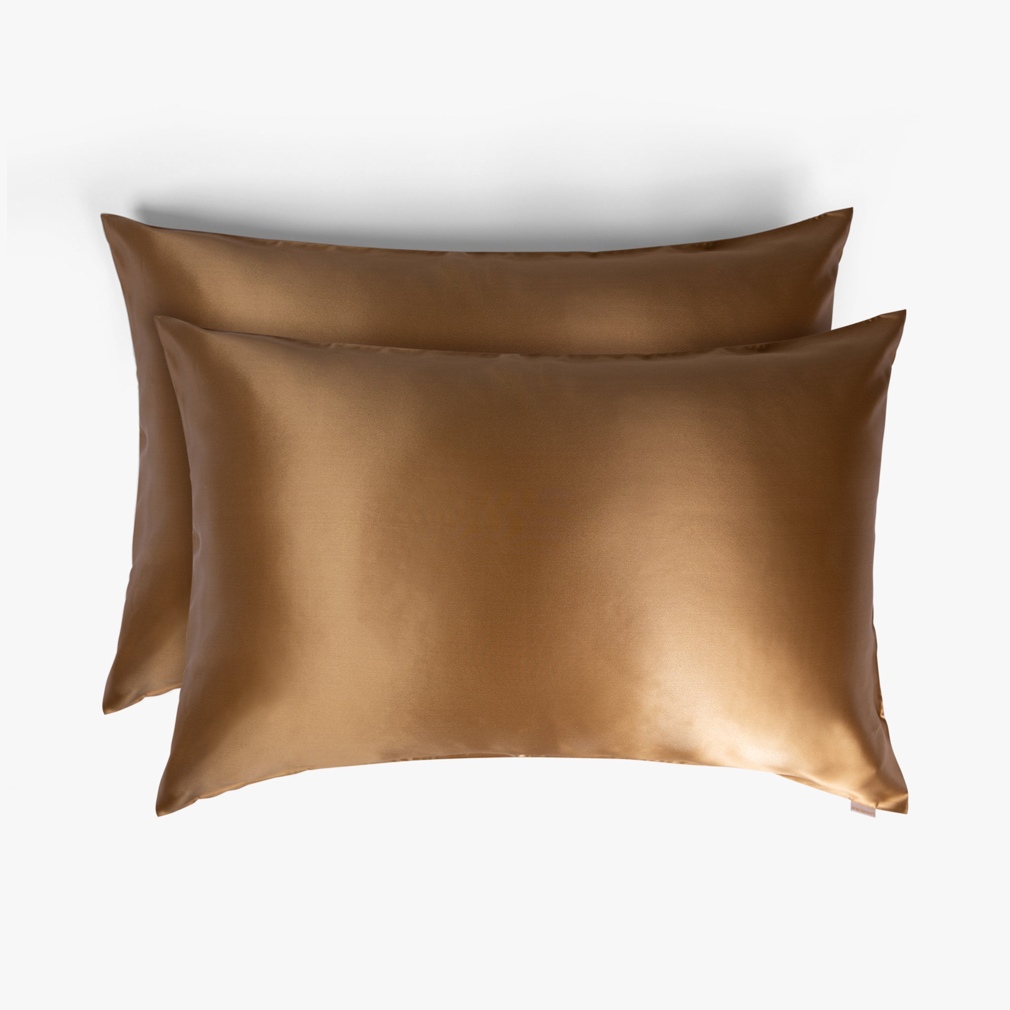 Amber gold silk pillowcases set of two stacked
