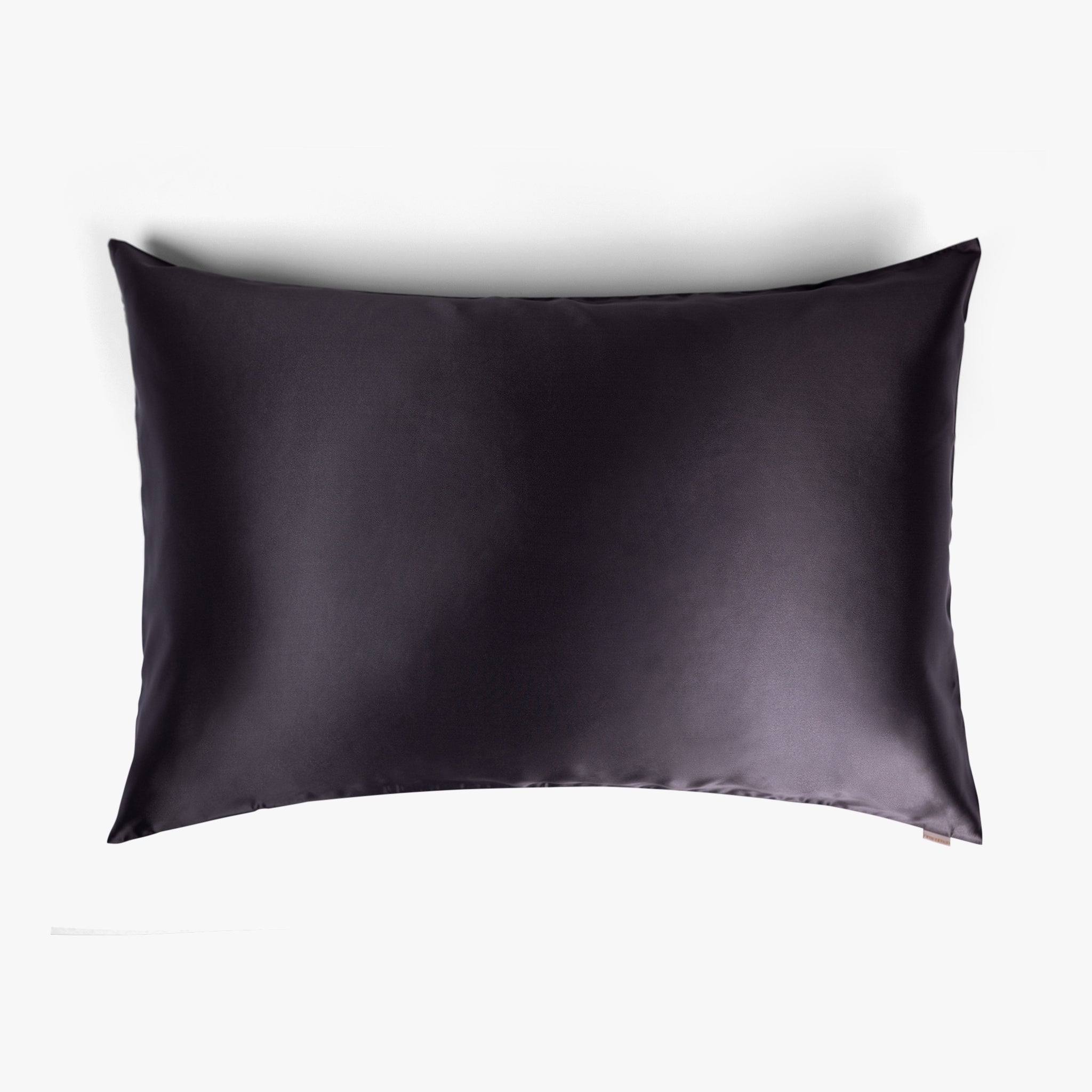 Dark grey silk pillowcase on white background
