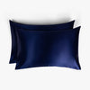 Navy blue silk pillowcases set of two stacked

