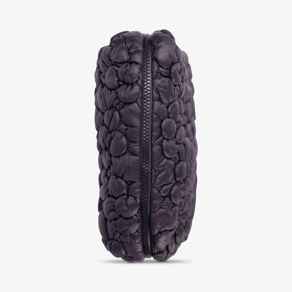 Black nylon cosmetic pouch with floral pattern
